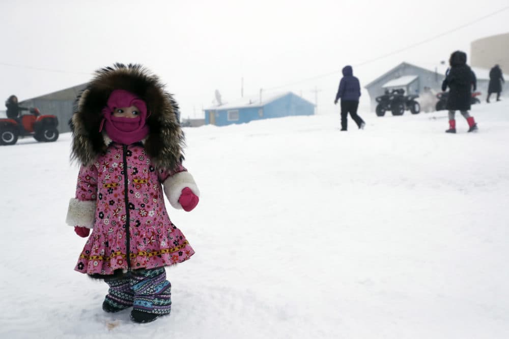A girl waits for her mother on Jan. 19 in Toksook Bay, Alaska. The first Americans to be counted in the 2020 census starting Tuesday live in this Bering Sea coastal village. (Gregory Bull/AP)