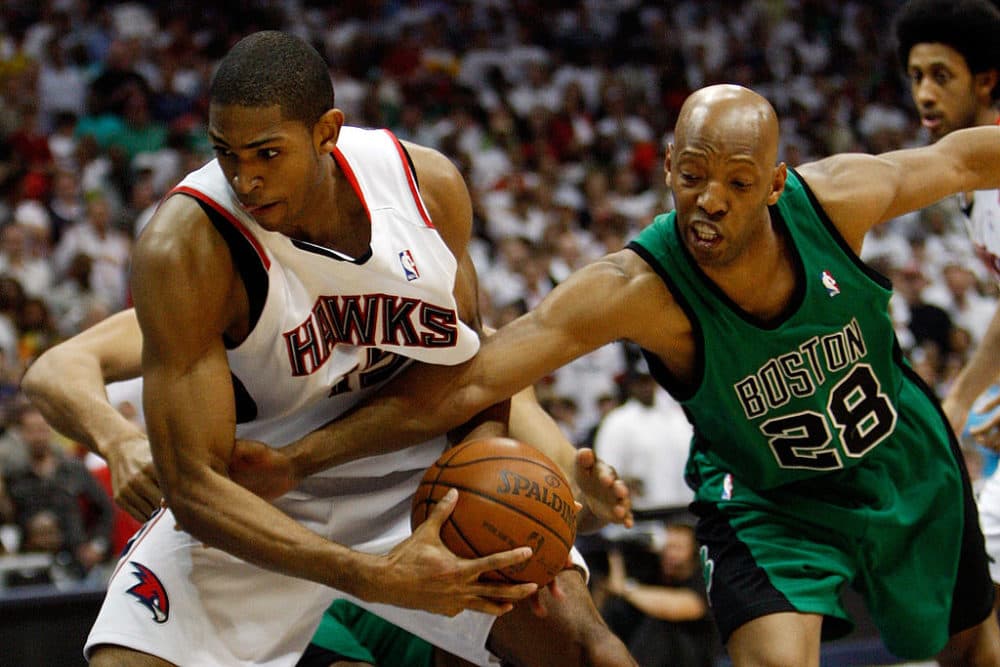 Al Horford is fouled by Sam Cassell of the Boston Celtics in the 2008 Eastern Conference Quarterfinals. (Chris Graythen/Getty Images)