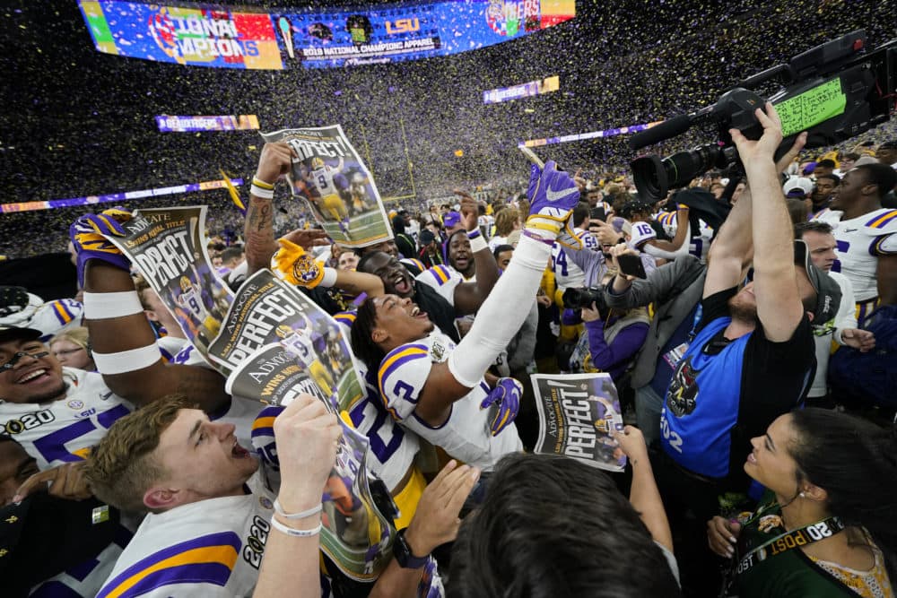 LSU celebrates after their win against Clemson in the NCAA College Football Playoff national championship game on Monday in New Orleans. (David J. Phillip/AP)