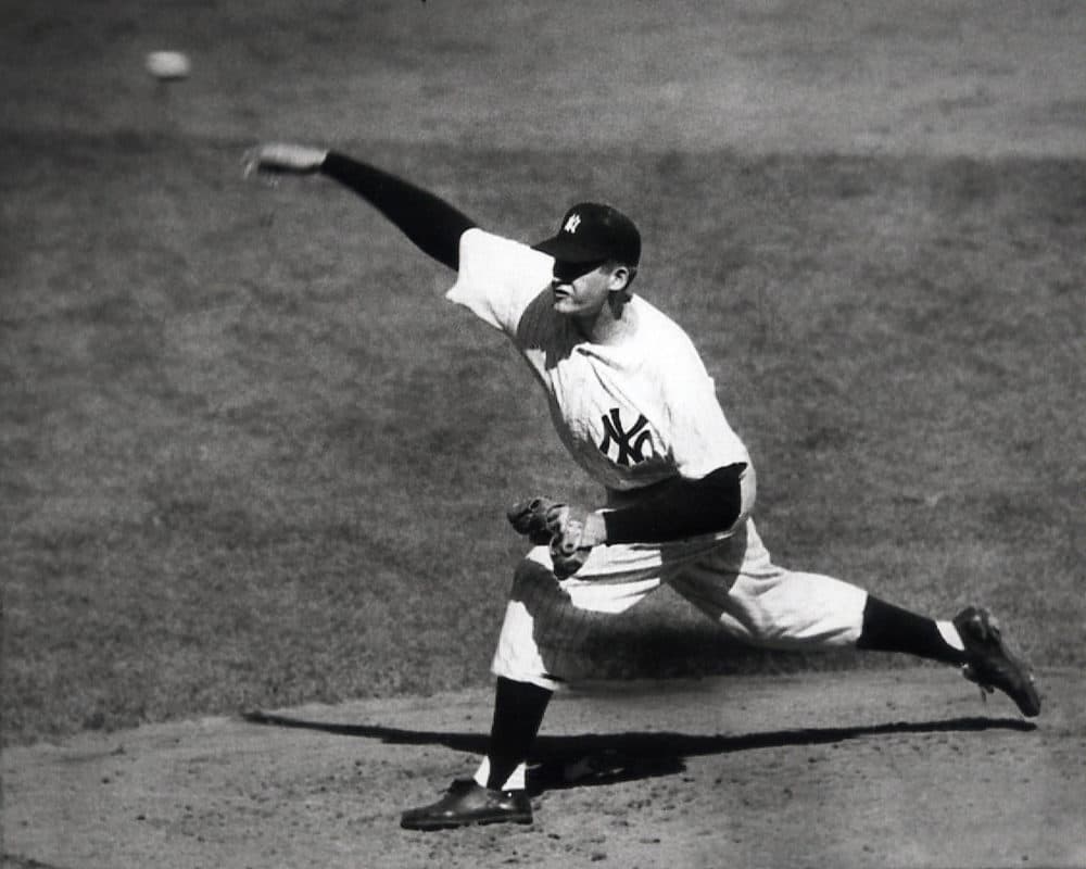 Yankees pitcher Don Larsen throws against the Brooklyn Dodgers, enroute to a perfect game in Game 5 of the 1956 World Series. (AP Photo)