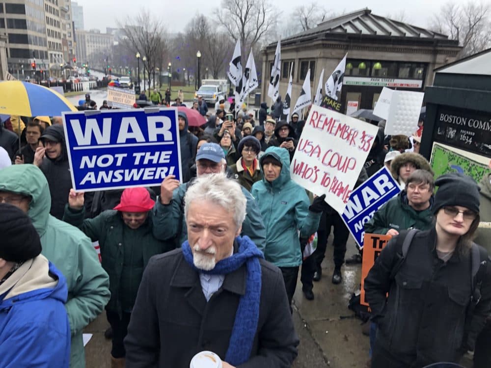 Anti-war demonstrators gather in near Park Street MBTA station in Boston on Janurary 4 in response to the killing of Iranian Maj. Gen. Qassem Soleimani. (Bruce Gellerman/WBUR)