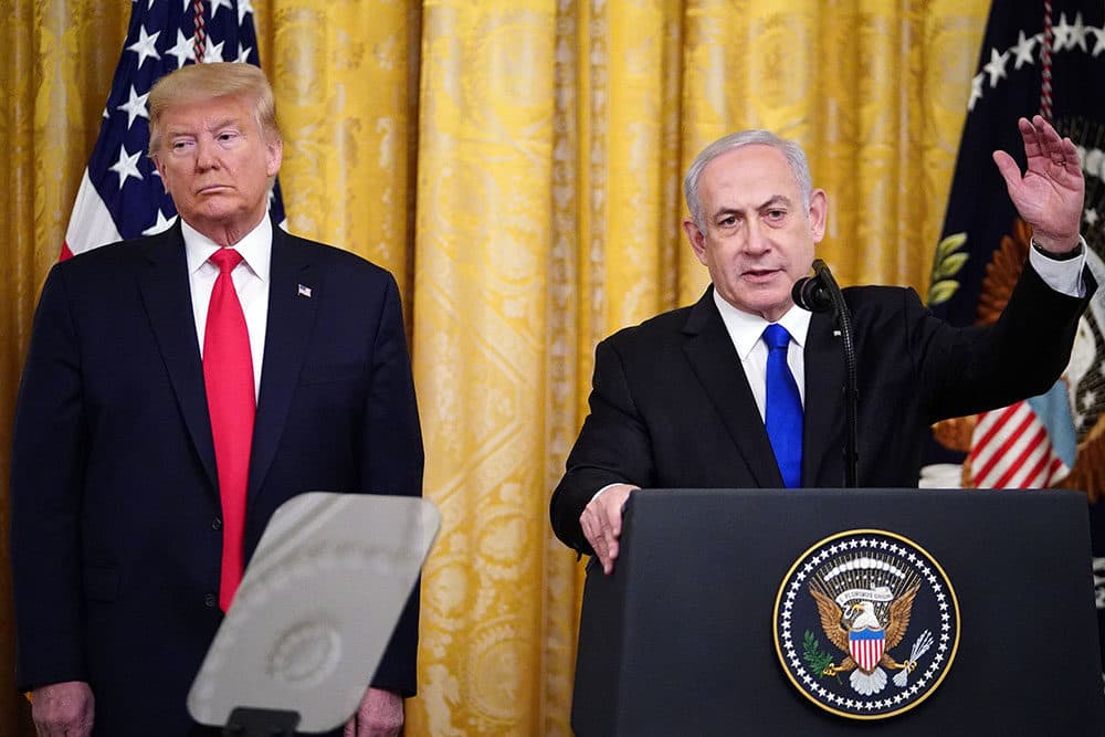 U.S. President Donald Trump and Israeli Prime Minister Benjamin Netanyahu take part in an announcement of Trump's Middle East peace plan in the East Room of the White House in Washington, D.C. on January 28, 2020. (MANDEL NGAN/AFP via Getty Images)