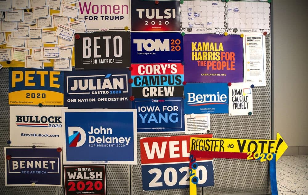 Presidential campaign signs on the wall in the Drake University Student Center. in Des Moines, IA. (Jesse Costa/WBUR)