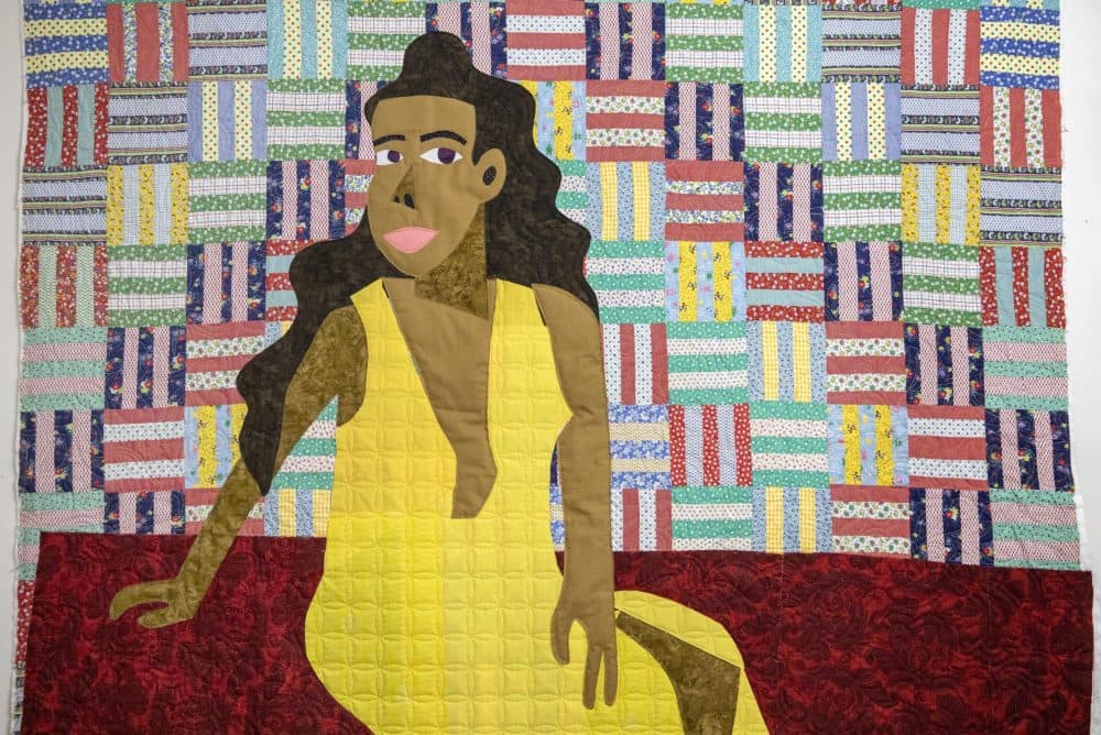 A portrait of the artist's sister, Latoya Anderson by quilt artist Michael Thorpe. (Robin Lubbock/WBUR)