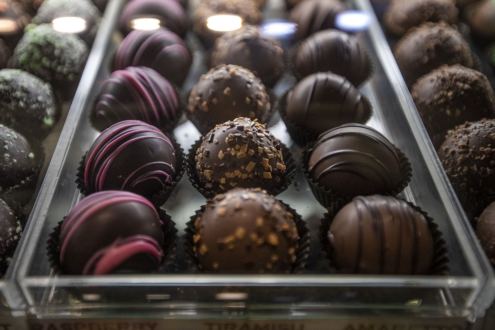 Today's truffles carry on the legacy of early French-inspired chocolates offered by amorous suitors. (Jesse Costa/WBUR)