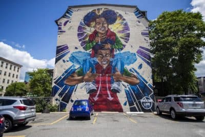 This June 2019 photo features the mural, &quot;Breathe Life,&quot; by the artist Problak Gibbs at 808 Tremont Street in Roxbury. (Jesse Costa/WBUR)