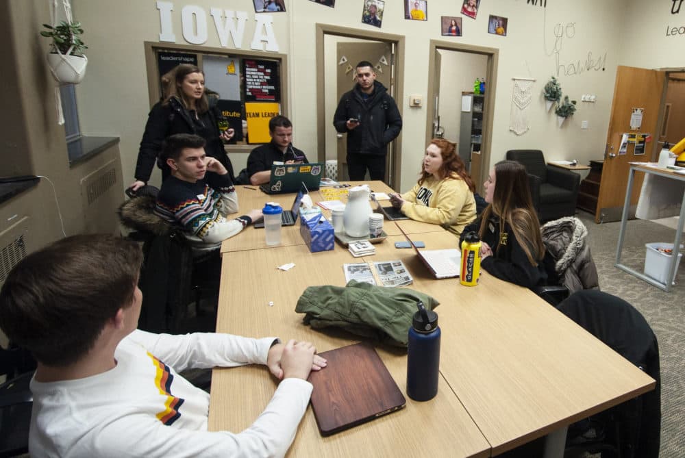 Members of Hawk the Vote, a nonpartisan group to increase youth turnout in the 2020 elections and Iowa caucuses at the University of Iowa hold a Q&A session about the upcoming caucuses in Iowa City. (Chris Bentley/Here & Now)