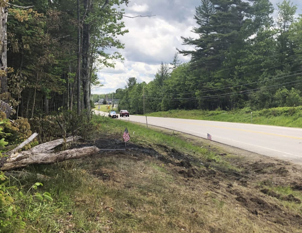 Tire marks are visible June 22, 2019, at the scene of a deadly crash involving motorcyclists with a club comprised of ex-United States Marines, who collided with a pickup truck on a rural highway in Randolph, N.H. (Michael Casey/AP)