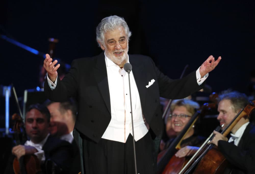 FILE - In this Aug. 28, 2019 file photo, opera star Placido Domingo salutes spectators at the end of a concert in Szeged, Hungary. The Metropolitan Opera confirms, Tuesday, Sept. 24, that Domingo has agreed to withdraw from all future performances at the Met, effective immediately. (AP Photo/Laszlo Balogh, File)