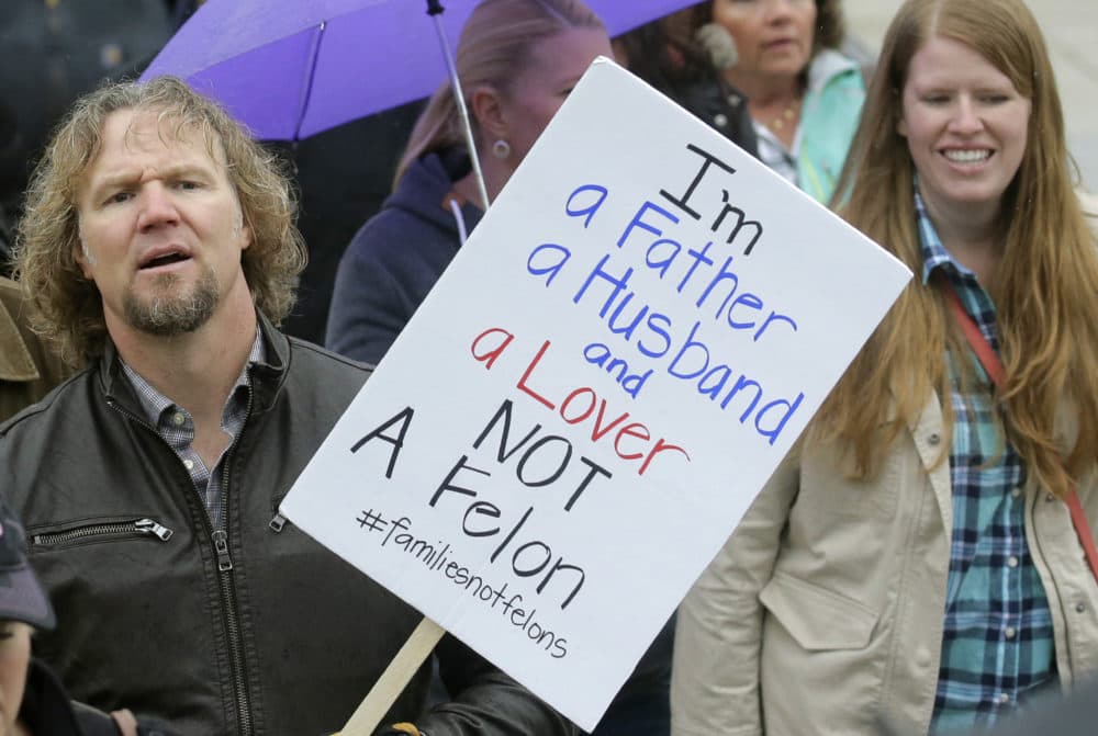 Kody Brown from &quot;Sister Wives,&quot; a popular TV reality series about a polygamous family, marches during a protest at the state Capitol in Salt Lake City during 2017.(Rick Bowmer/AP)