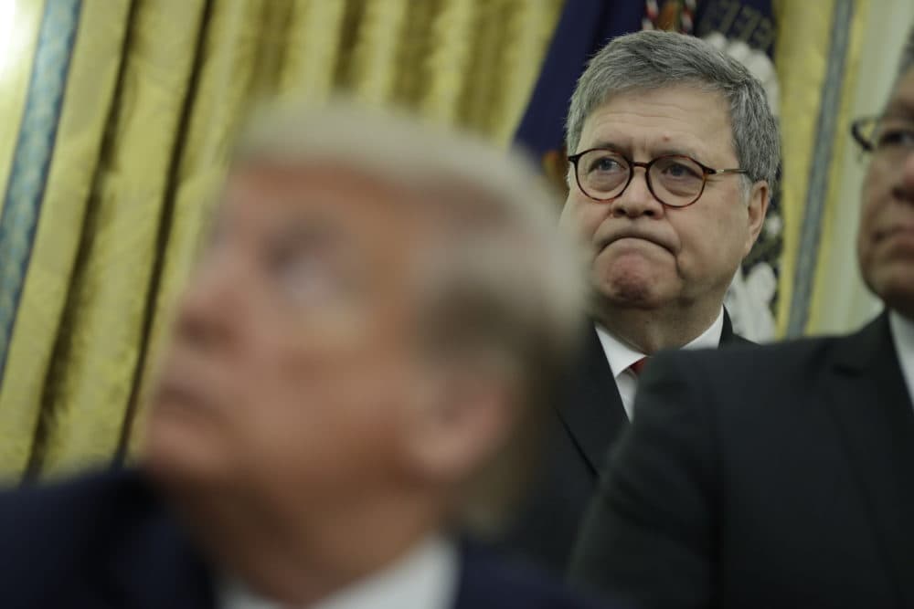 Attorney General William Barr listens as President Donald Trump speaks during an event in the Oval Office of the White House, Tuesday, Nov. 26, 2019, in Washington. (Evan Vucci/AP)