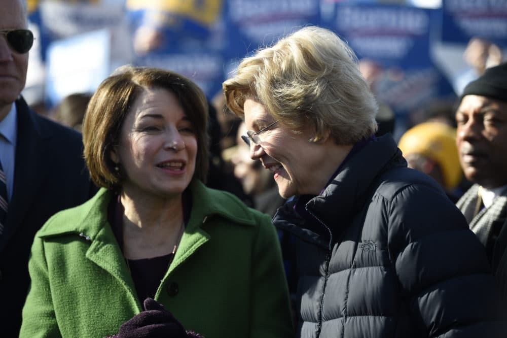 Sens. Amy Klobuchar and Elizabeth Warren speak on Jan. 20, 2020, as they line up for a Martin Luther King Jr. Day march in Columbia, S.C.(Meg Kinnard/AP)