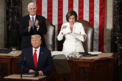 House Speaker Nancy Pelosi of Calif., tears her copy of President Donald Trump's s State of the Union address after he delivered it to a joint session of Congress on Capitol Hill in Washington, Tuesday, Feb. 4, 2020. Vice President Mike Pence is at left. (Alex Brandon/AP)