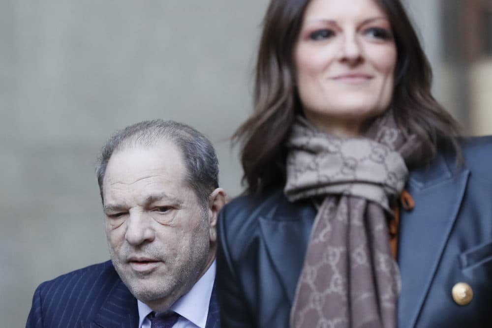 Harvey Weinstein, left, and attorney Donna Rotunno, right, leave a Manhattan courthouse during his rape trial on Feb. 19 in New York. (John Minchillo/AP)