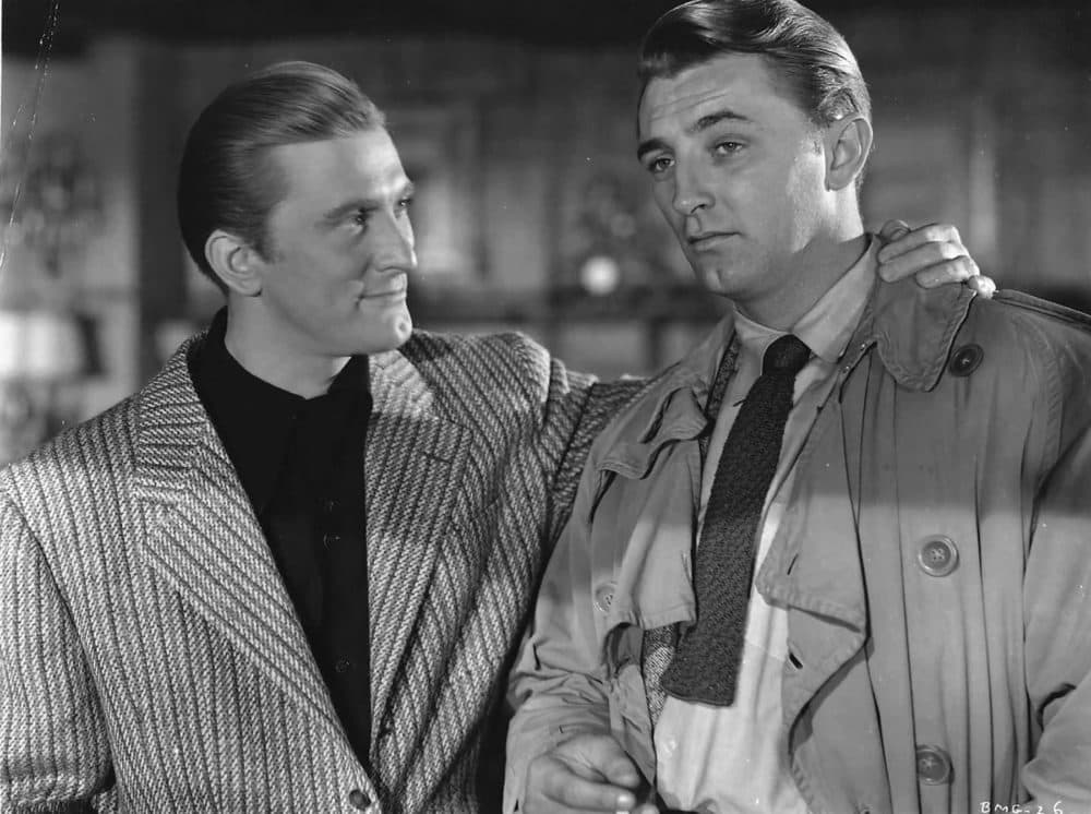 Kirk Douglas, left, with Robert Mitchum in a still from the film &quot;Out of the Past.&quot; (Courtesy the Brattle Theatre)