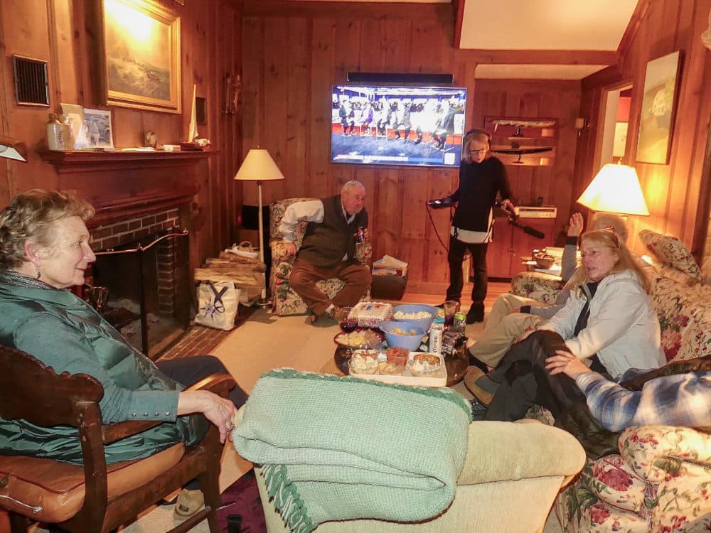 Host Robin Young interviews five neighbors gathered to watch the Democratic debate Friday night. (Karyn Miller-Medzon/Here & Now)