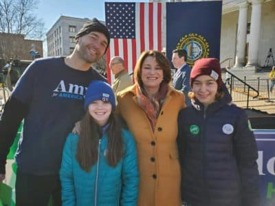 Jeremy Coylewright with his two daughters, Willa and Angel, with Amy Klobuchar on Nov. 6 in Concord, New Hampshire. (Courtesy Jeremy Coylewright)