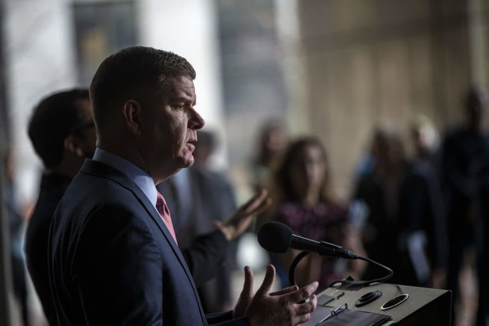 Boston Mayor Marty Walsh addresses the public in front of City Hall Plaza on Friday to give updates relating to COVID-19. (Jesse Costa/WBUR)