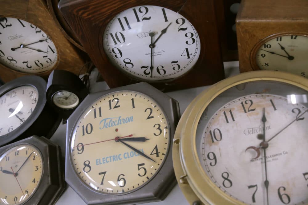 In this Thursday, March 5, 2020, photo, antique clocks are displayed at the Electric Time Company, in Medfield, Massa. Most Americans will lose an hour of sleep this weekend, but gain an hour of evening light for months ahead, as Daylight Saving Time returns this weekend. The time change officially starts Sunday at 2 a.m. local time. (Charles Krupa/AP)