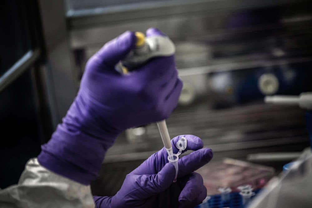 A scientist is at work in the VirPath university laboratory, classified as &quot;P3&quot; level of safety, on February 5, 2020 as they try to find an effective treatment against the new coronavirus (Jeff Pachoud/AFP via Getty Images)