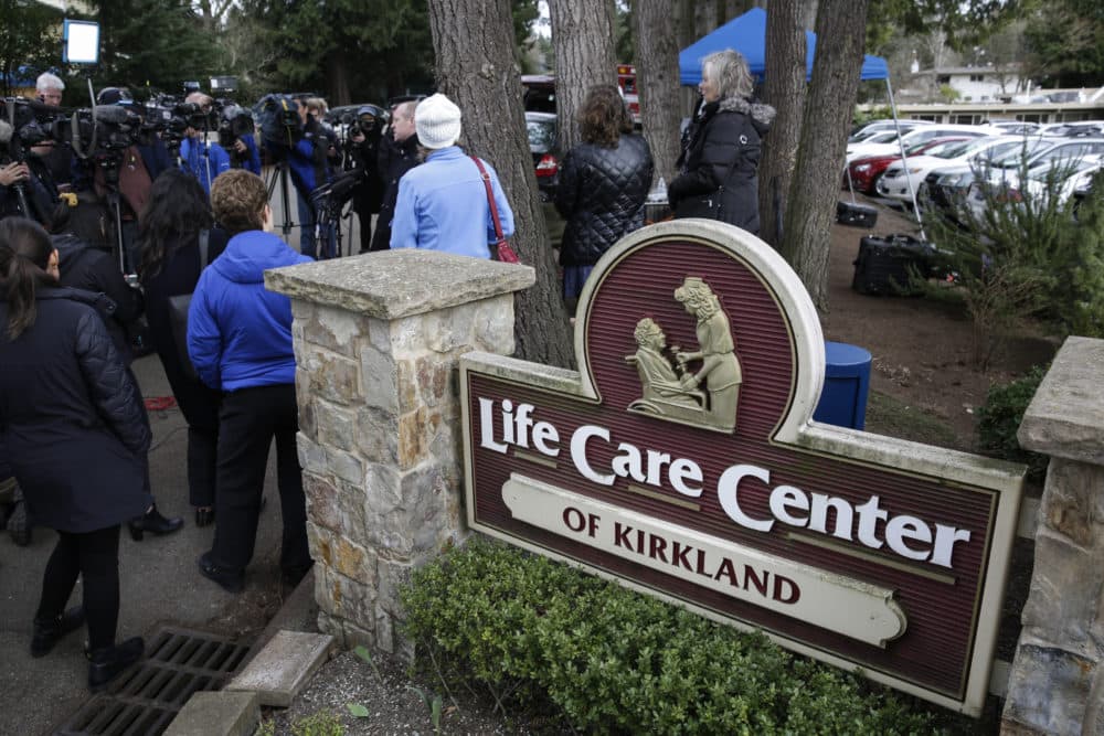 Family members of residents of the Life Care Center nursing home, where some patients have died from COVID-19, hold a press conference outside the center in Kirkland, Washington on March 5. (Jason Redmond/AFP via Getty Images)
