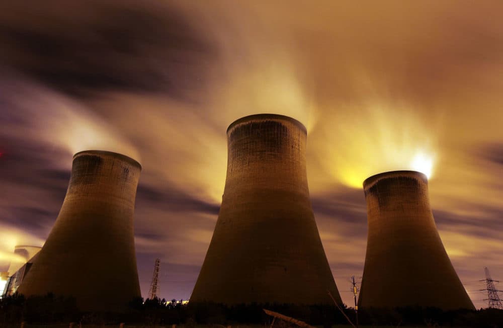 The coal fueled Fiddlers Ferry power station emits vapor into the night sky in Warrington, United Kingdom. (Christopher Furlong/Getty Images)
