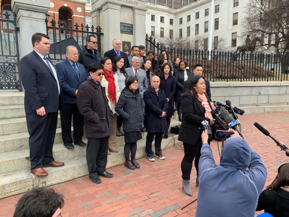 Members of the Asian American Commission, who gathered at the state house to decry racism and xenophobia against Asian Americans during the coronavirus pandemic. (Steve Brown/WBUR)