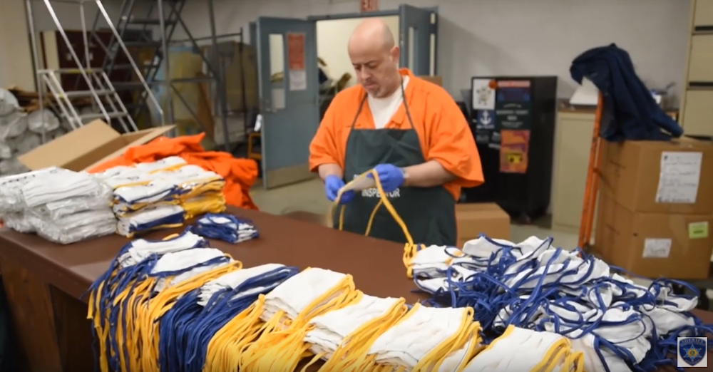 A still from a video posted by the Hampden County Sheriff's office. Prisoners there are making masks and gowns to protect people from the coronavirus. 