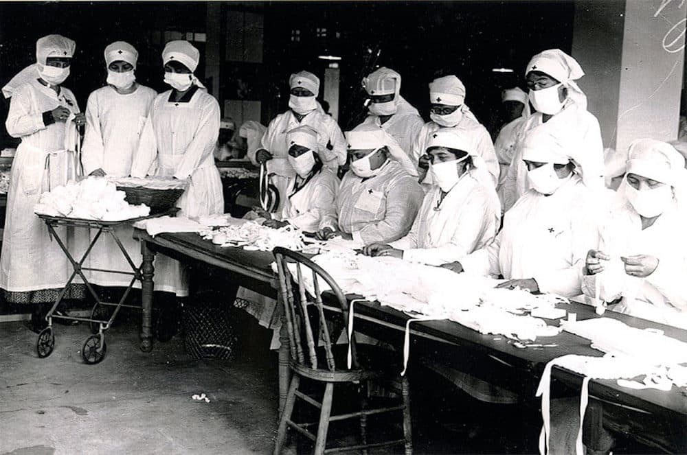Red Cross volunteers assemble gauze masks at Camp Devens (Courtesy the Fort Devens Museum)