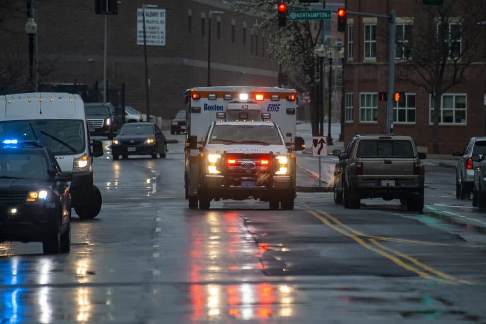 A Boston EMS ambulance races down Albany Street towards Boston Medical Center. (Jesse Costa/WBUR)