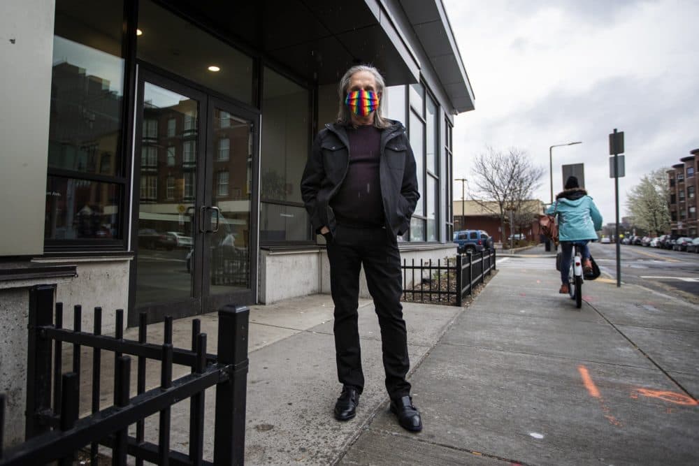 Rob Quinn standing outside of his apartment building in Boston. (Jesse Costa/WBUR)