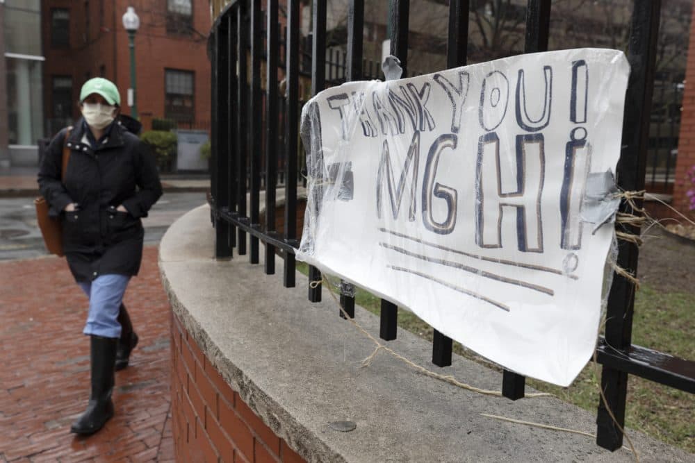 A make-shift sign posted outside Massachusetts General Hospital expresses thanks to MGH, Friday, April 3, 2020, in Boston. (Michael Dwyer/AP)