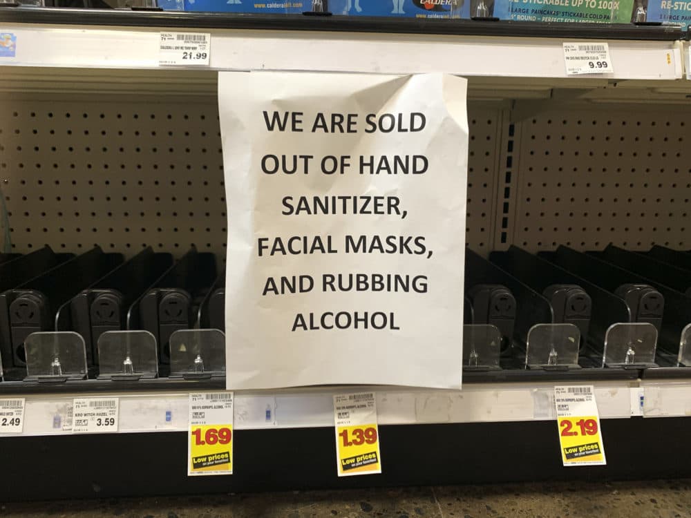 A sign advising out-of-stock sanitizer, facial masks and rubbing alcohol is seen at a store following warnings about COVID-19 in Kirkland, Washington on March 5, 2020. (JASON REDMOND/AFP via Getty Images)