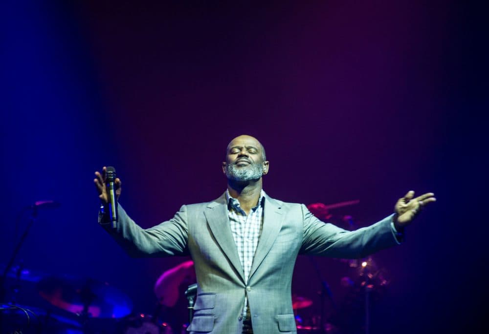 This picture taken on March 22, 2018 shows US singer Brian McKnight performing during a concert in Surabaya. (Juni Kriswanto/AFP via Getty Images)