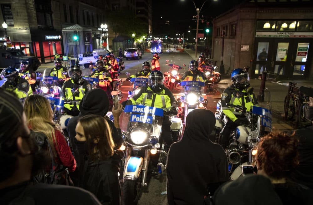 Police motorcycles block protestors way on Tremont Street on May 31, 2020. (Robin Lubbock/WBUR)