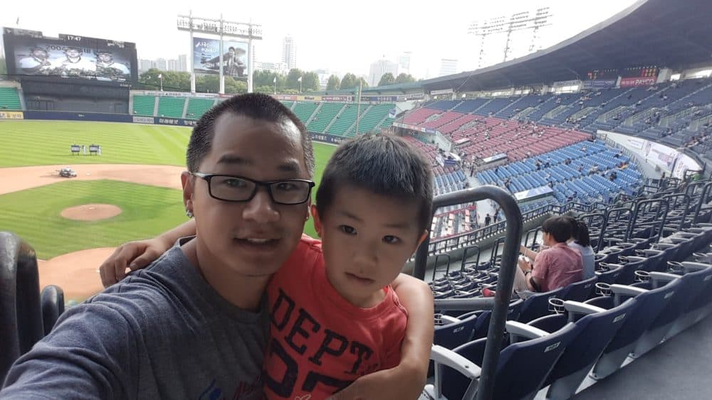 Dan Kurtz, a long time fan of the Korean Baseball Organization, with his oldest son at Jamsil Stadium in Seoul, South in 2015. (Dan Kurtz)