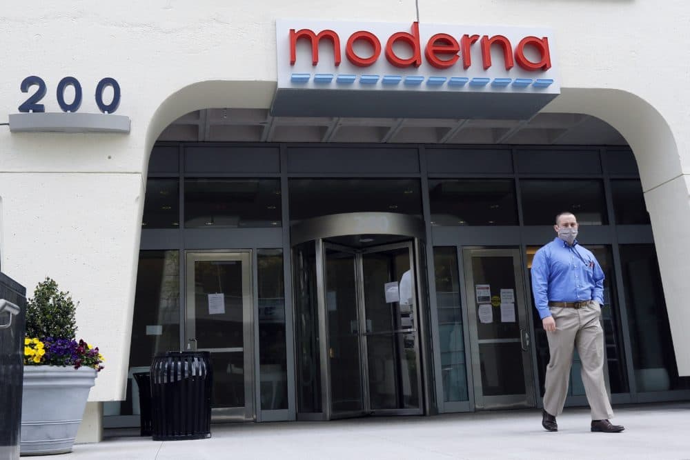 A man stands outside an entrance to a Moderna, Inc., building, May 18, 2020, in Cambridge, Mass. Moderna announced Monday that an experimental vaccine against the coronavirus showed encouraging results in very early testing.(Bill Sikes/AP)