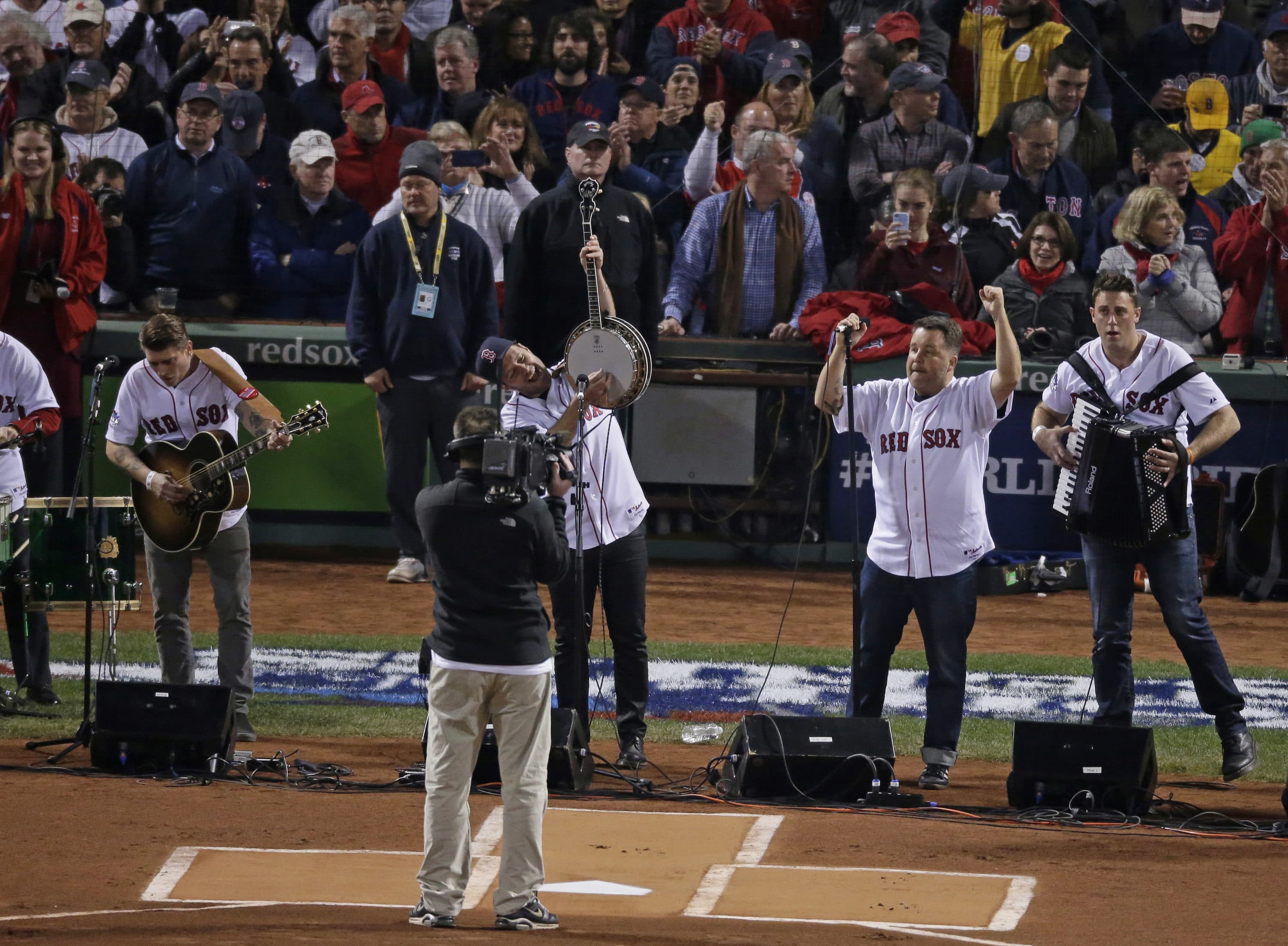 Dropkick Murphys perform before Game 6 of baseball's World Series between the Boston Red Sox and the St. Louis Cardinals Wednesday, Oct. 30, 2013, in Boston. (Charlie Riedel/AP)