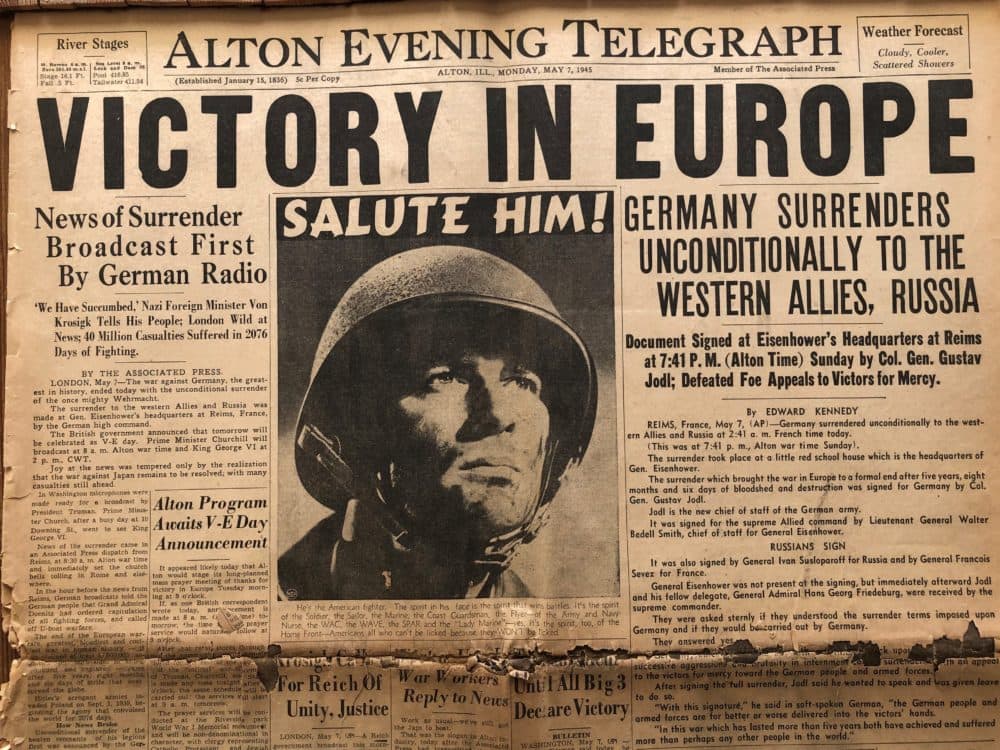 The Alton Evening Telegraph reporting the news of Germany's surrender.