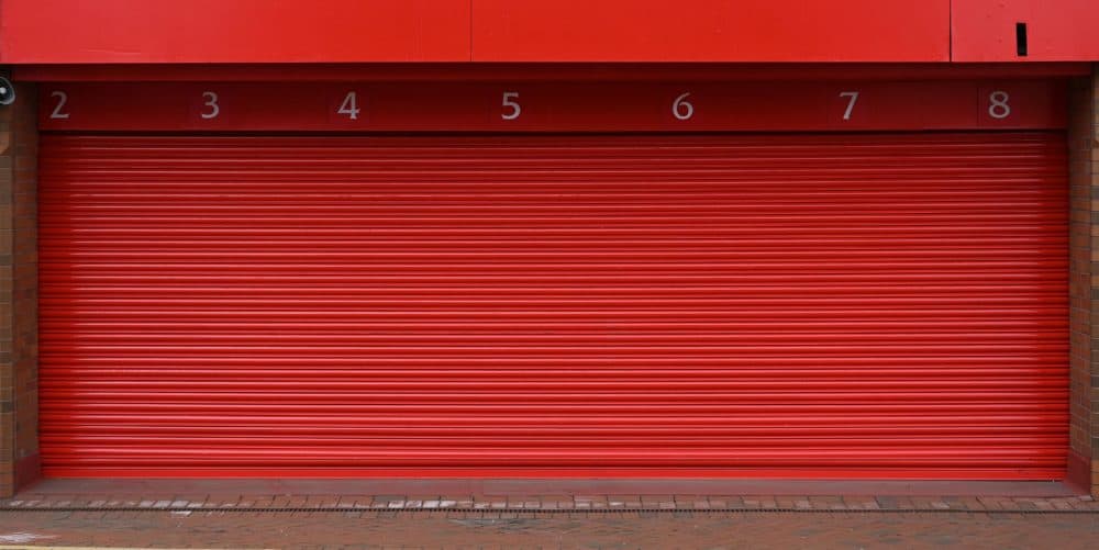 A picture shows a closed shutter at Liverpool football club's stadium Anfield in Liverpool, northwest England. (Paul Ellis/AFP via Getty Images)