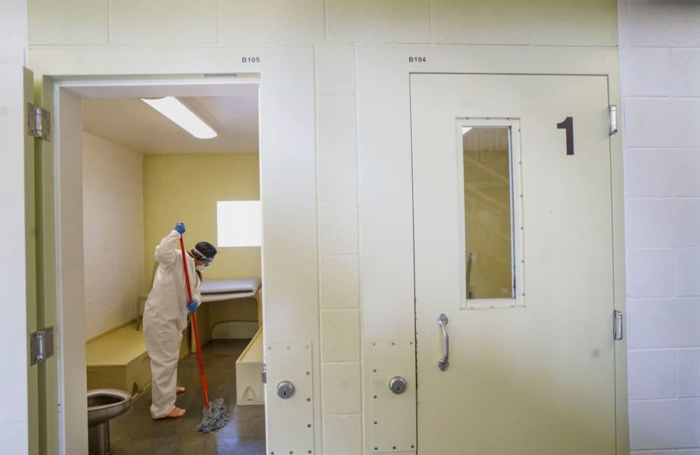 An inmate cleans a jail cell at Las Colinas Women's Detention Facility in Santee, California, on April 22, 2020. (SANDY HUFFAKER/AFP via Getty Images)
