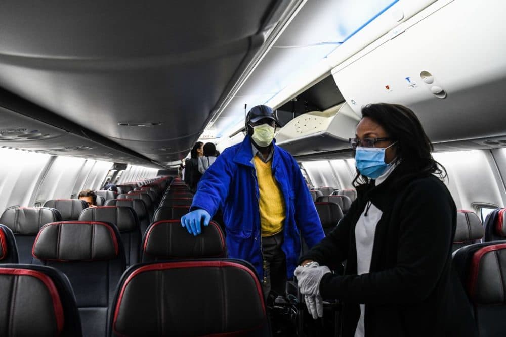 Passengers wait to disembark the plane on their arrival at Hartsfield-Jackson Atlanta International Airport in Atlanta, on April 23, 2020. (Chandan Khanna/AFP/Getty Images)
