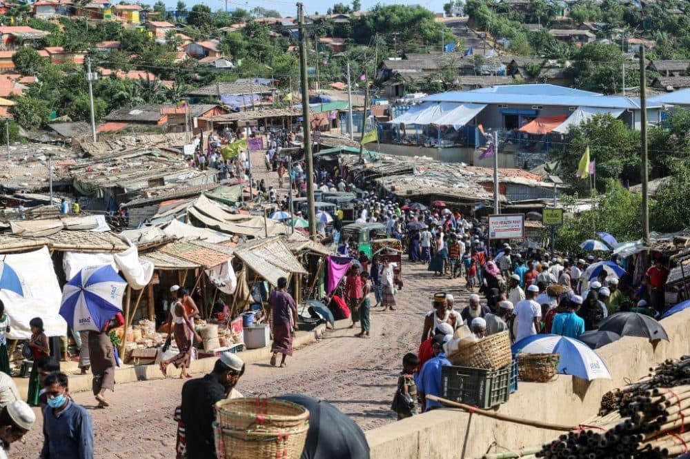 Rohingya refugees gather at a market as first cases of COVID-19 coronavirus have emerged in the area, in Kutupalong refugee camp in Ukhia on May 15, 2020. (Suzauddin Rubel/AFP/Getty Images)