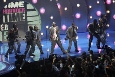 Rapper MC Hammer (center) and dancers perform at the MTV music video awards in Miami 28 August 2005. (Robert Sullivan/AFP via Getty Images)