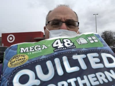 April 29: Bruce Gellerman takes a picture of himself holding toilet paper he managed to find at a well-stocked Target after weeks of empty store shelves.(Bruce Gellerman / WBUR)