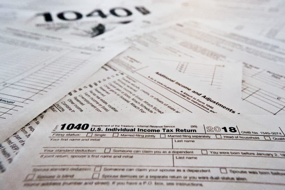 This photo made on Feb. 13, 2019, in Zelienople, Pa., shows multiple forms printed from the Internal Revenue Service web page that are used for 2018 U.S. federal tax returns. (Keith Srakocic/AP)