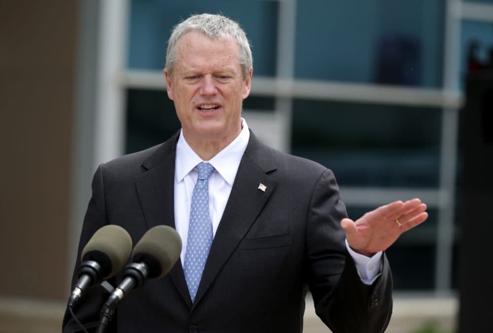 Gov. Charlie Baker spoke with the media after he swore in the Massachusetts State Police 85th Recruit Training Troop, at their graduation ceremony at Gillette Stadium. (Jonathan Wiggs/Boston Globe)