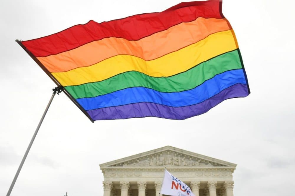 LGBTQ rights demonstrators rally outside the U.S. Supreme Court on October 8, 2019. (Saul Loeb/AFP/Getty Images)