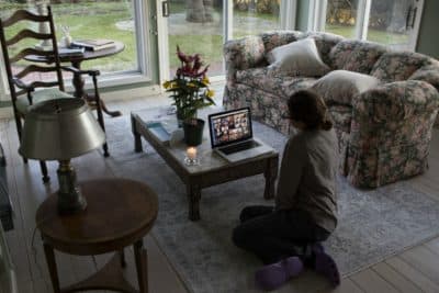 A family sits shiva remotely on Zoom for an elderly relative who died of heart failure, April 11, 2020 in New Canaan, Conn.(Andrew Lichtenstein/Corbis via Getty Images)