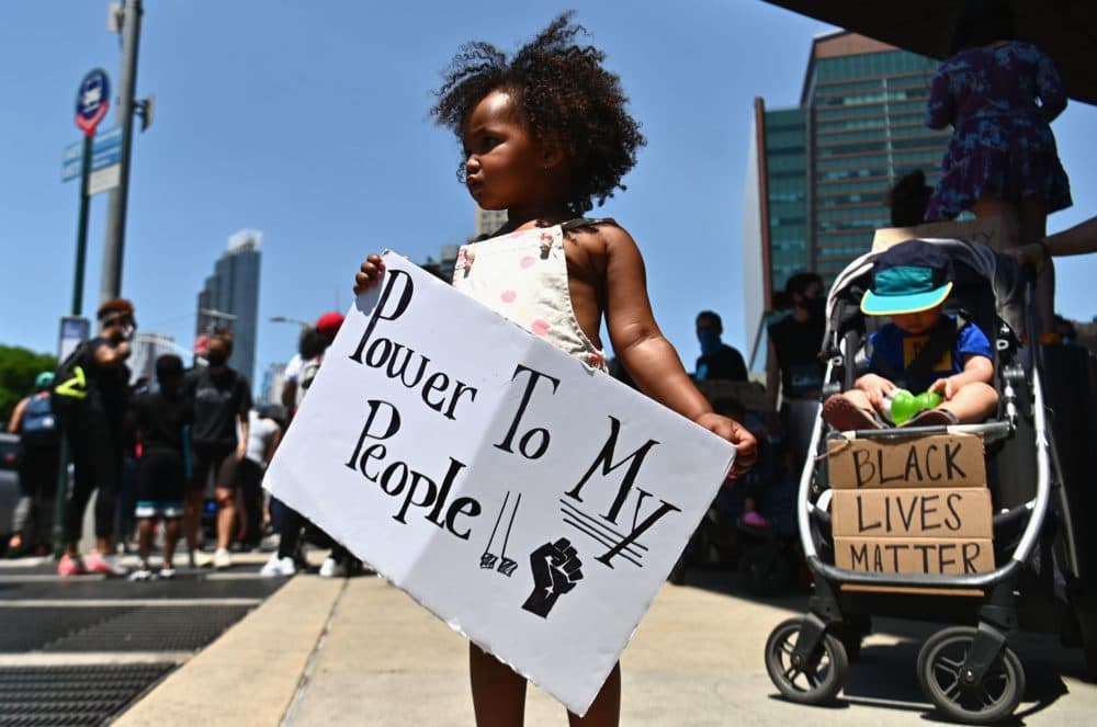 Families participate in a children's march in solidarity with the Black Lives Matter movement and national protests against police brutality on June 9, 2020 in the Brooklyn Borough of New York City. (Angela Weiss/ AFP/Getty Images)
